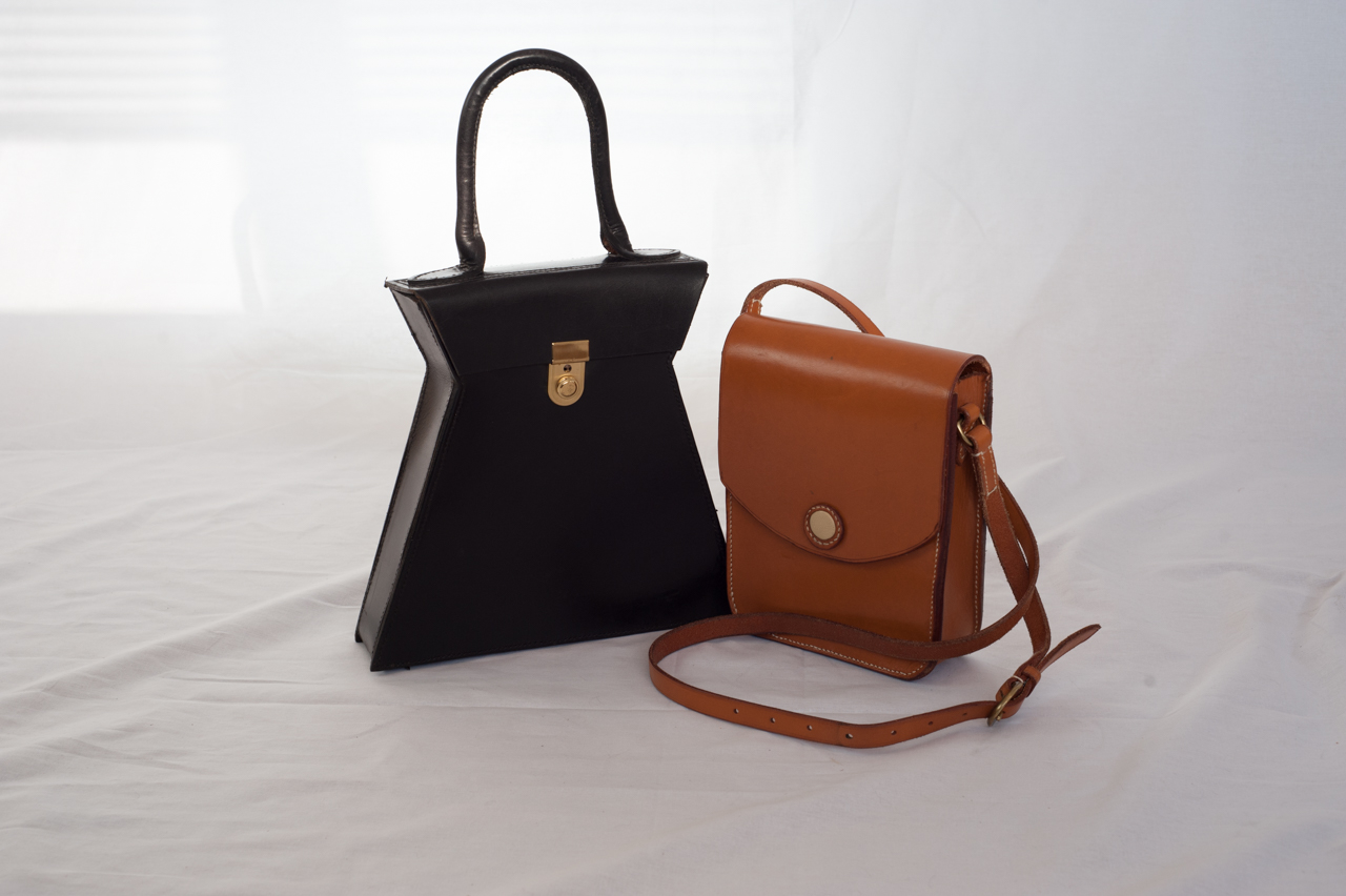 Driftwood Bag in black and The Salisbury Shoulder bag in tan